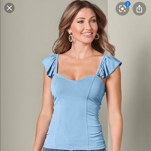 Light blue sweetheart top.